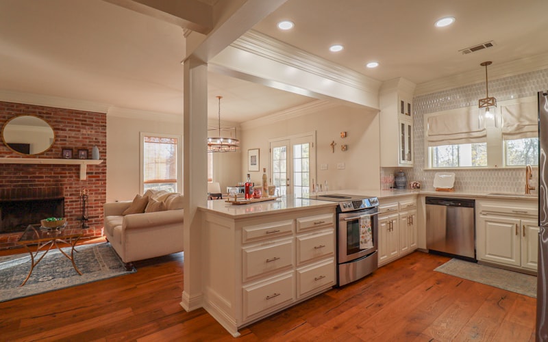 Modern kitchen with recessed lighting and pendant fixtures